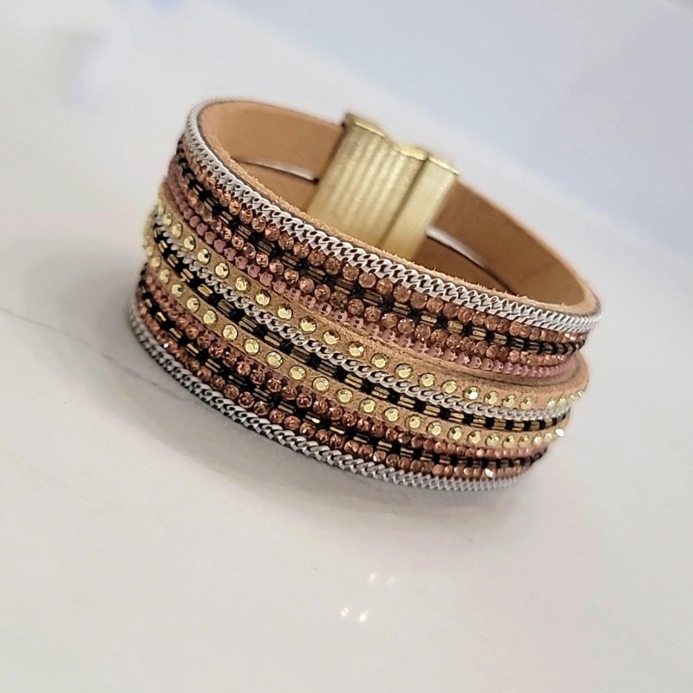 Faux leather strap bracelet with rhinestones and magnetic clasp